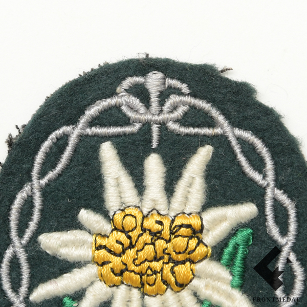 Змблема Эдельвейс на китель горнострелковых частей