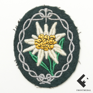 Змблема Эдельвейс на китель горнострелковых частей